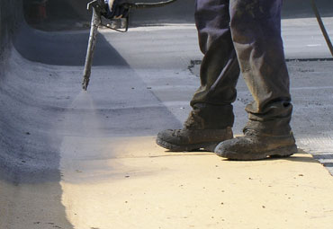 Coating systems over Milwaukee spray foam roof systems